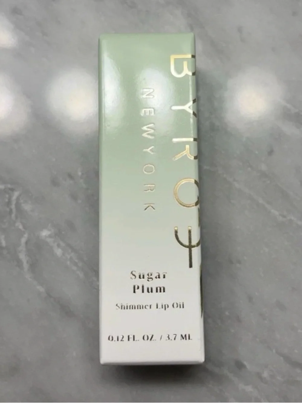Byroe Sugar Plum Shimmer Lip Oil - Mint Green & White Packaging